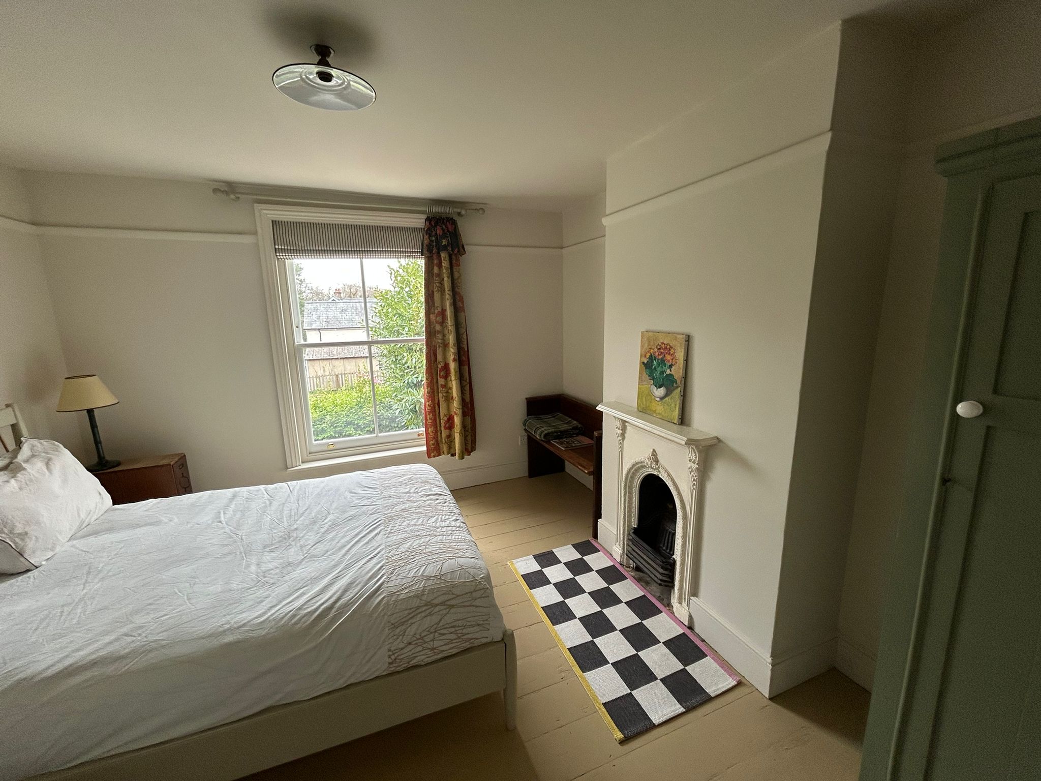 Principal bedroom with comfortable bedding